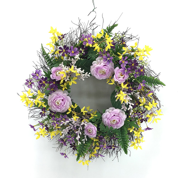 Lila und gelber gemischter Blumenkranz